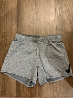 Nike Women’s Light Gray Athletic Shorts with Black Swoosh